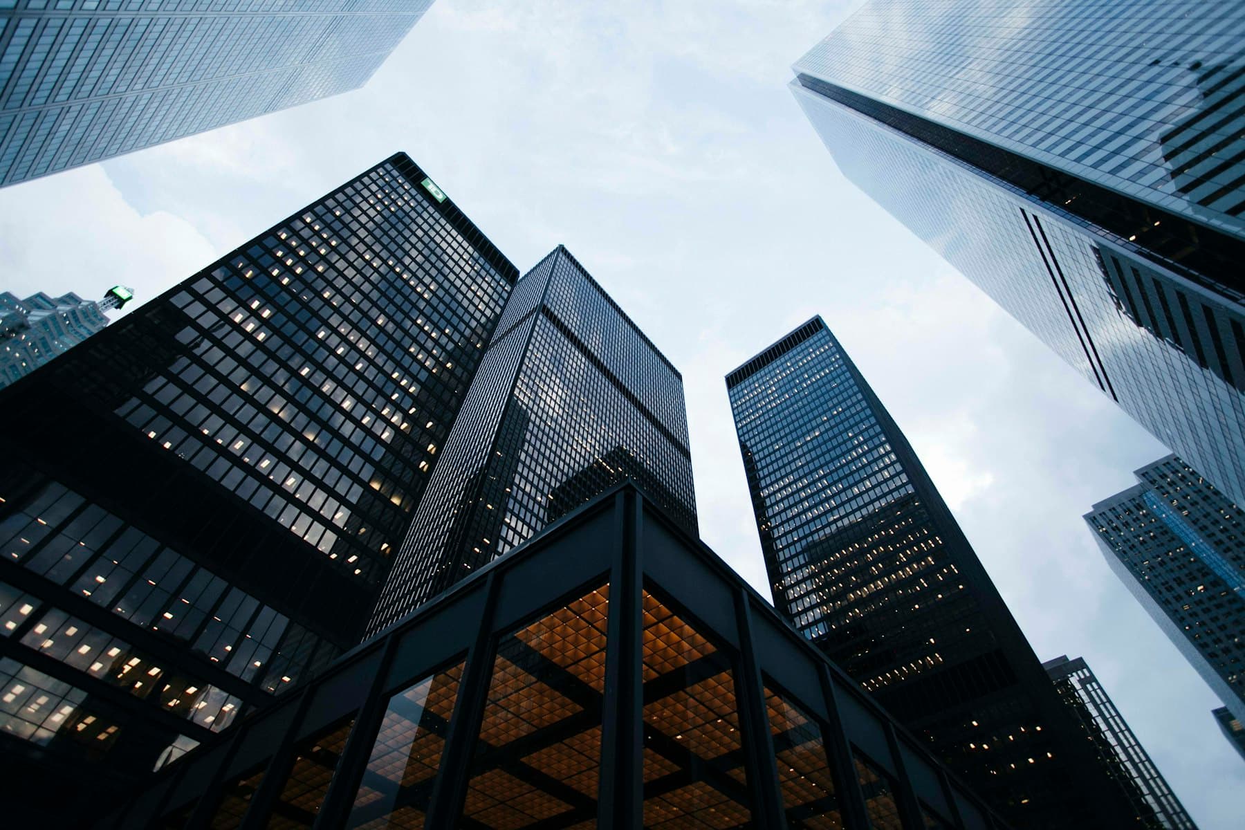 Looking up between glass towers